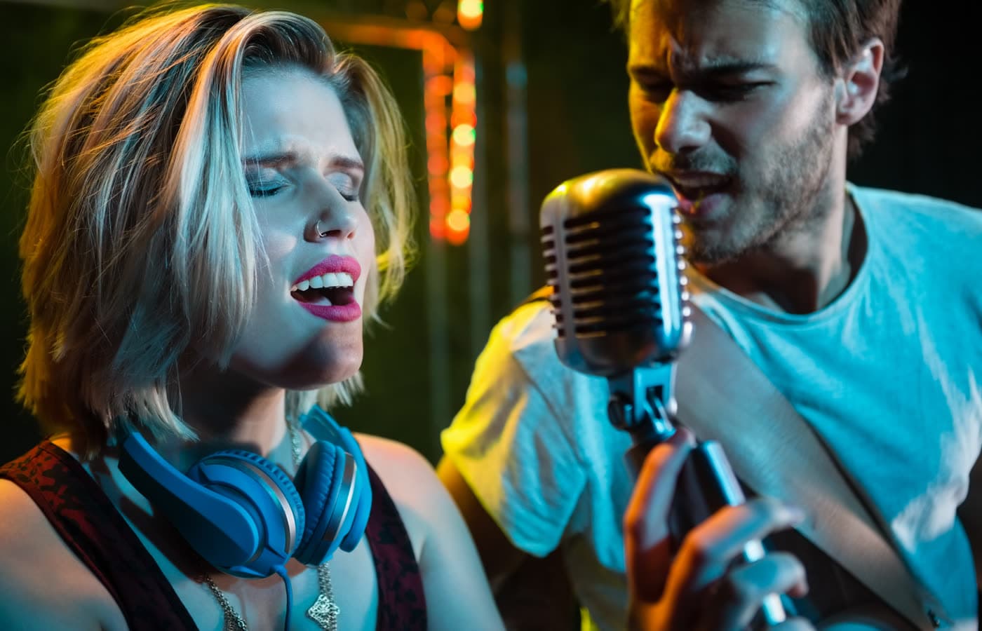 Singers recording a cinematic vocal performance
