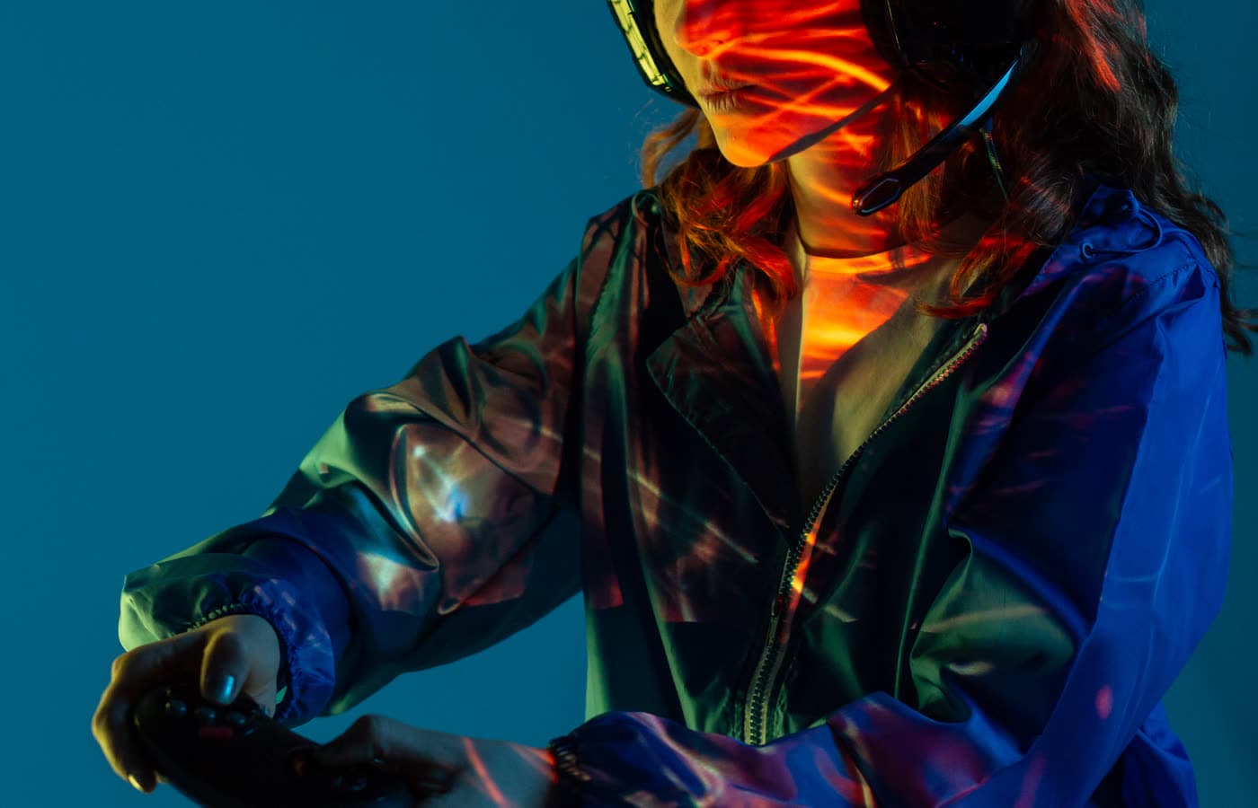 Spotlit performer at a rock-tinted stage